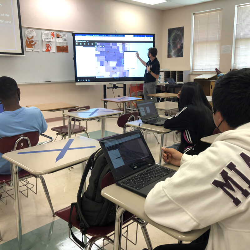 Lake Worth High School teacher Erik Johnson exploring social vulnerability on a GIS map with his students.