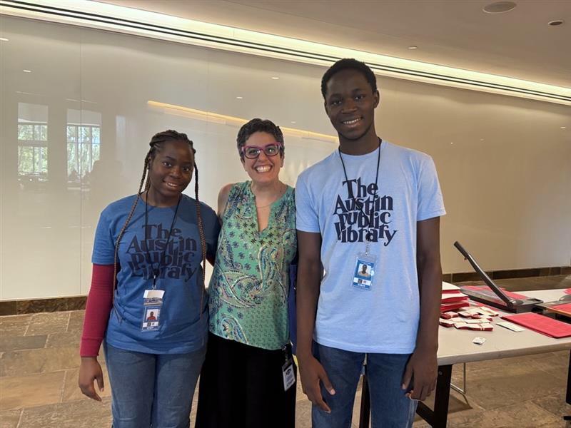 Franck and Janet posing with their mentor, Laura Tadena of the Austin Public Library.