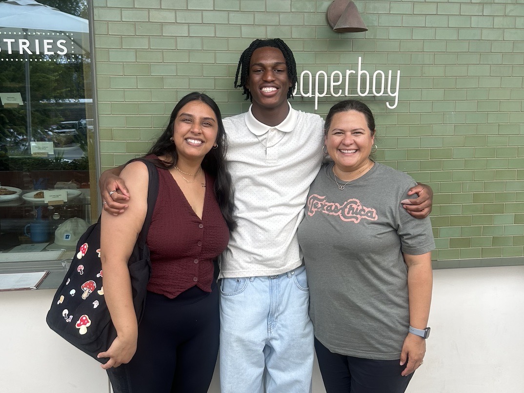 Elijah with Dr. Laura J. Cortez and Nirali Thakkar of Cortez Consulting Services.